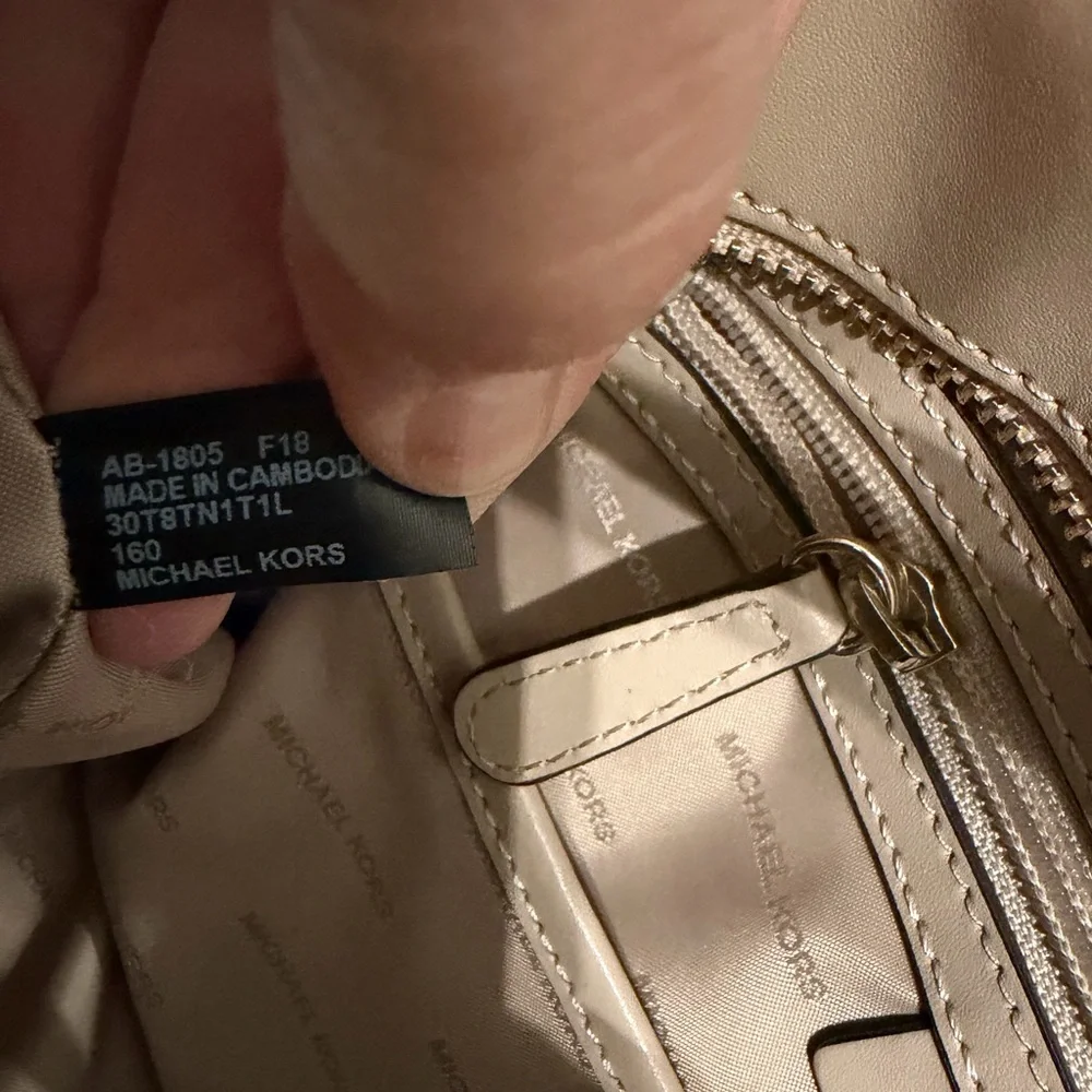 Beige medium sized Michael Kors handbag